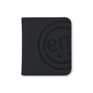 A black colored storage case designed like a photo book to keep all your ExpressionMed sensor patches organized and easy to find.