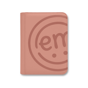 A cute, pink-colored photo book-style case for keeping all your favorite decorative tapes organized and easy to find.