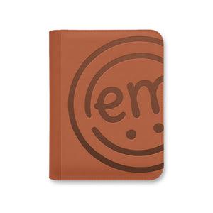 A warm caramel-camel storage book that keeps your colorful ExpressionMed patches visible and neat.