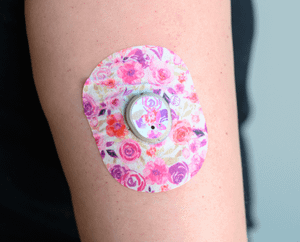 ExpressionMed, Romantic Blooms Dexcom G7 Transmitter Sticker, Single Sticker and Single Tape, Human Arm Wearing Romantic Blooms Designed CGM Adhesive Patch Design