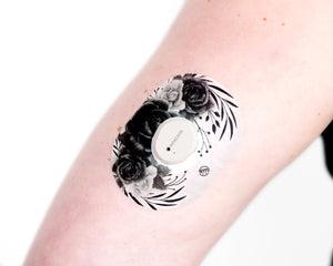 ExpressionMed Tattoo Rose Dexcom G7 Tape in use on arm