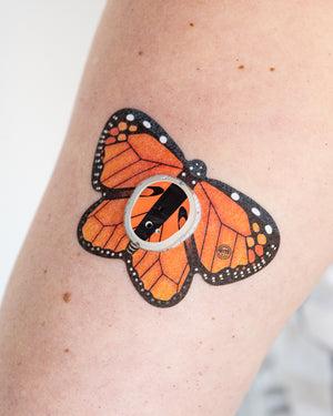 ExpressionMed, Monarch Butterfly Dexcom G7 Transmitter Sticker, Single Butterfly Tape and Single Sticker, Arm Wearing Monarch Butterfly Themed CGM Adhesive Patch Design