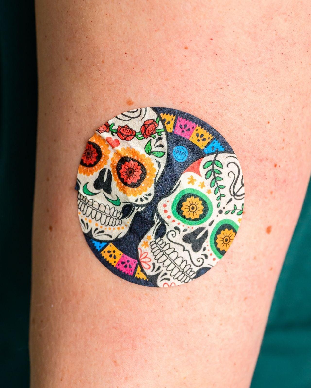 ExpressionMed, Dia de los Muertos Dexcom G7 and Stelo Overpatch, Human Wearing Dia de los Muertos Themed CGM Adhesive Patch Design.