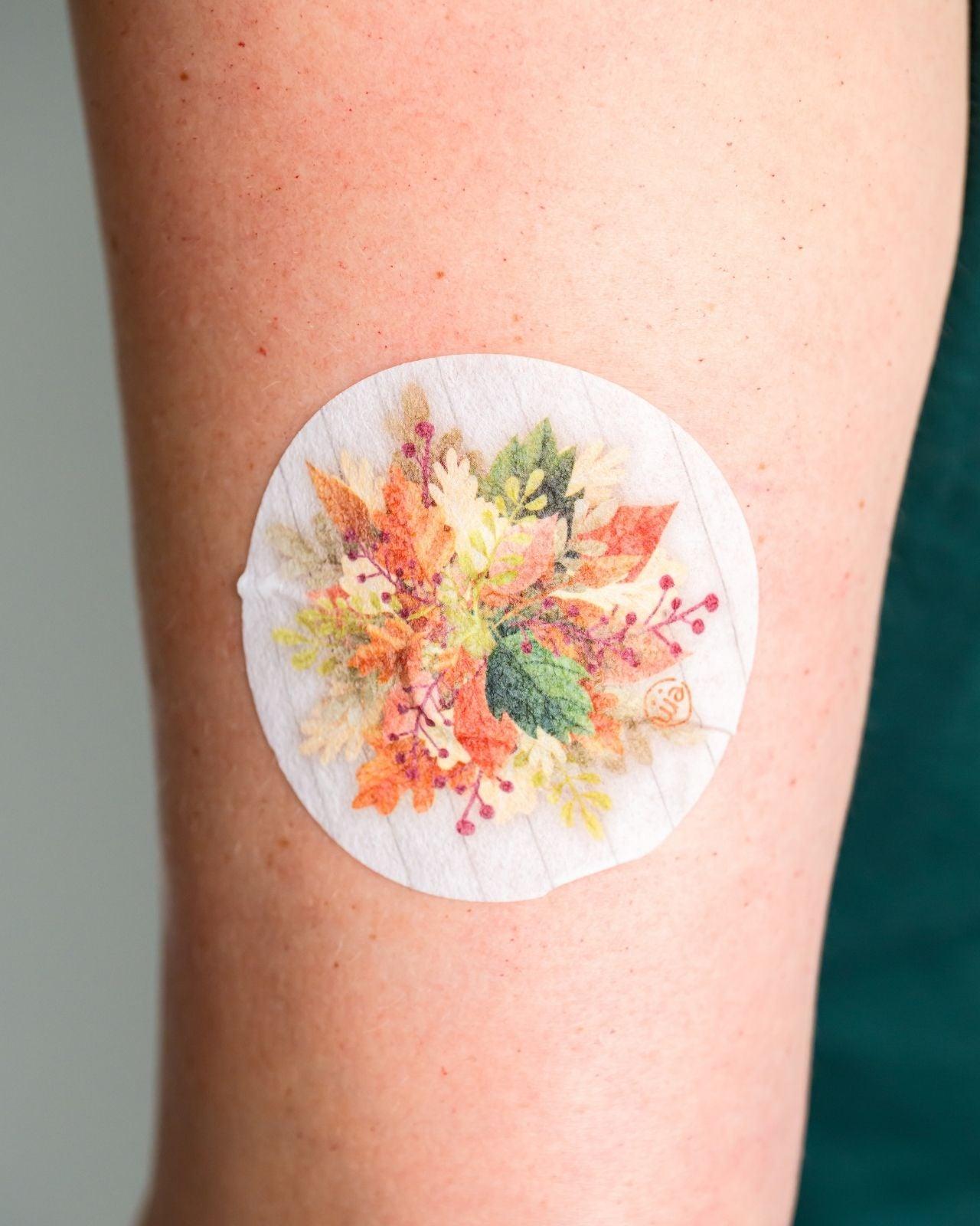 ExpressionMed, PAutumn Leaves Dexcom G7 and Stelo Overpatch, Single Tape , Human Wearing Autumn Leaves Themed CGM Adhesive Patch Design