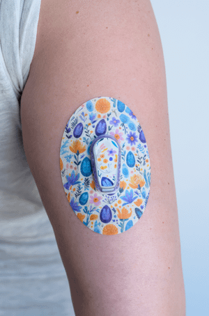 ExpressionMed, Easter Floral Dexcom G6 Tape, Tape & Sticker, Human Wearing Easter Floral Themed CGM Adhesive Patch Design