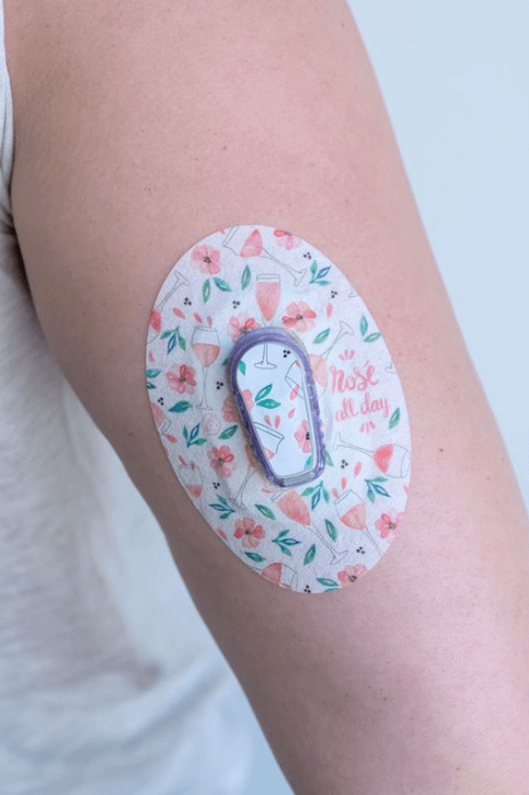 ExpressionMed, Rose All Day Dexcom G6 Transmitter Sticker, Tape & Sticker, Human Wearing Rose Themed CGM Adhesive Patch Design