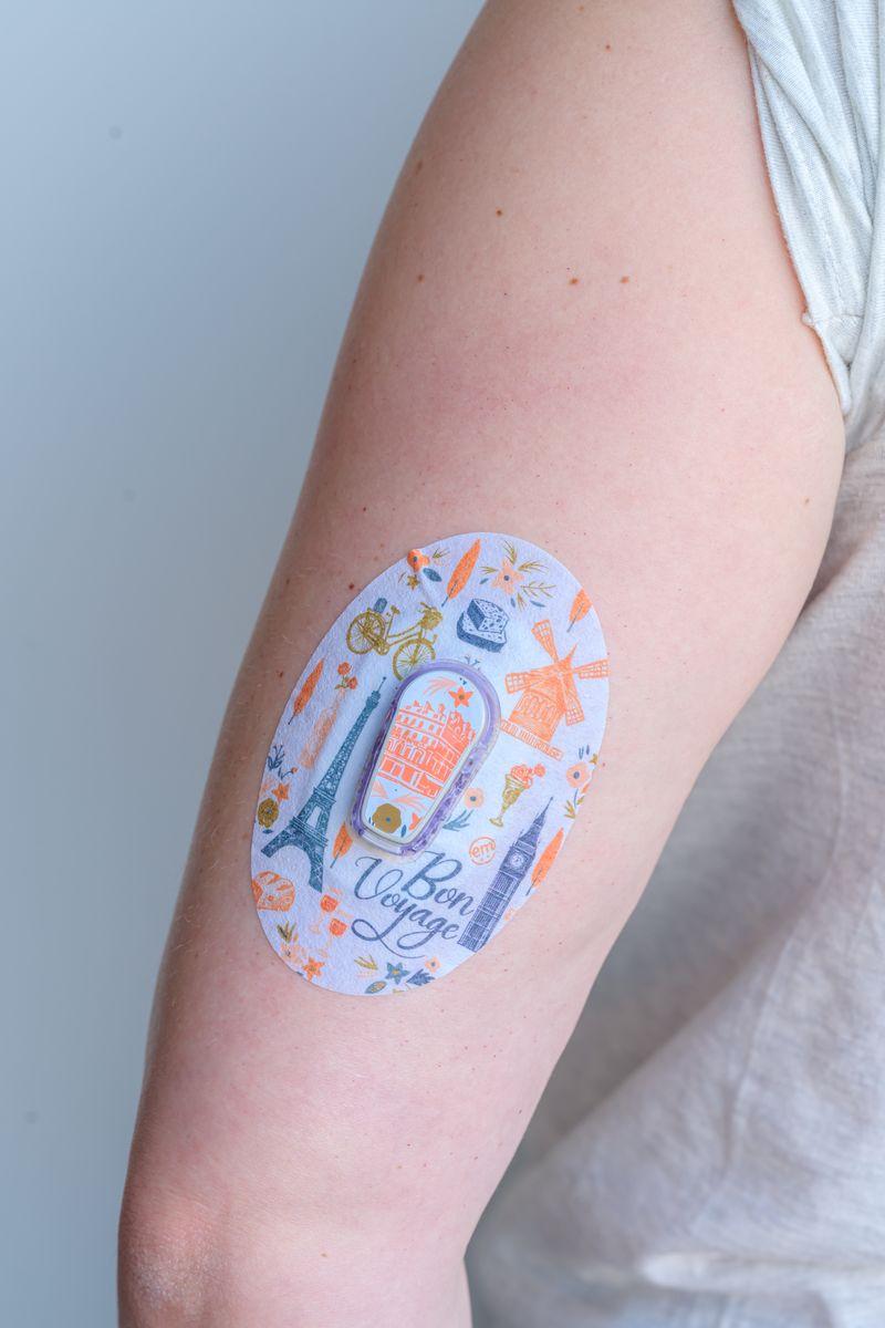 ExpressionMed Wanderlust Variety Pack Dexcom G6 Tape, Single Tape and Single Sticker, Arm Wearing Paris Themed CGM Adhesive Patch Design