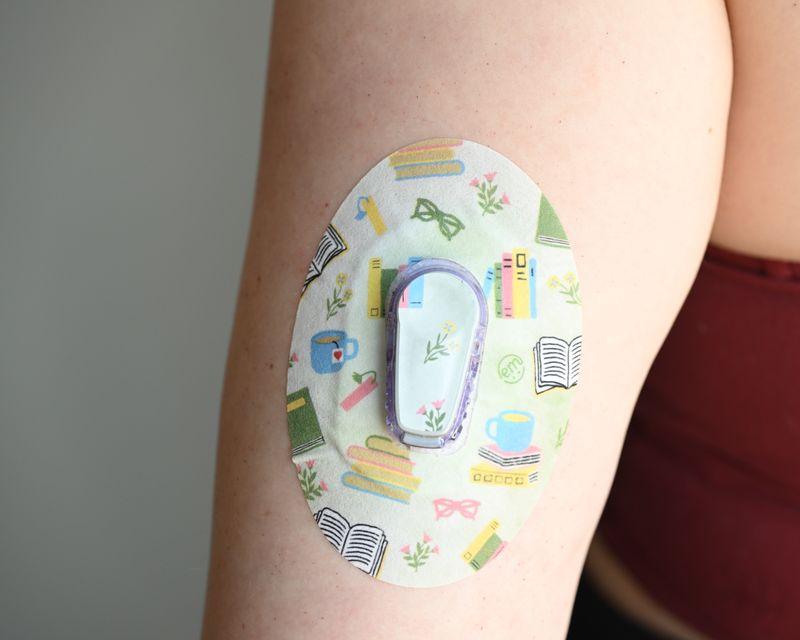 ExpressionMed Cozy Books Dexcom G6 Tape, Single Tape and Single Sticker, Arm Wearing Book Themed CGM Adhesive Patch Design