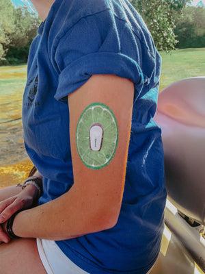 ExpressionMed, Sweet Citrus Variety Pack Dexcom G6 Tape, Single Tape, Woman Wearing Fruit Themed CGM Adhesive Patch Design