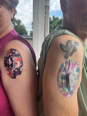 ExpressionMed Woman with Painted Flower Variety Dexcom G6 Tape and Transmitter Sticker on arm