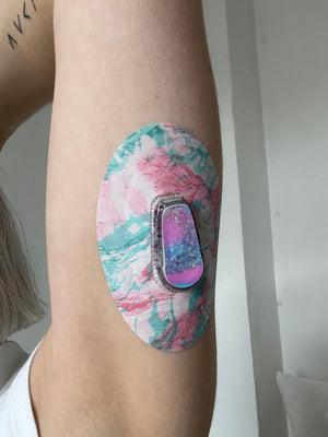 ExpressionMed Cotton Candy Variety Pack Dexcom G6 Tape, Single Tape and Single Sticker, Woman Wearing Marble Themed CGM Adhesive Patch Design