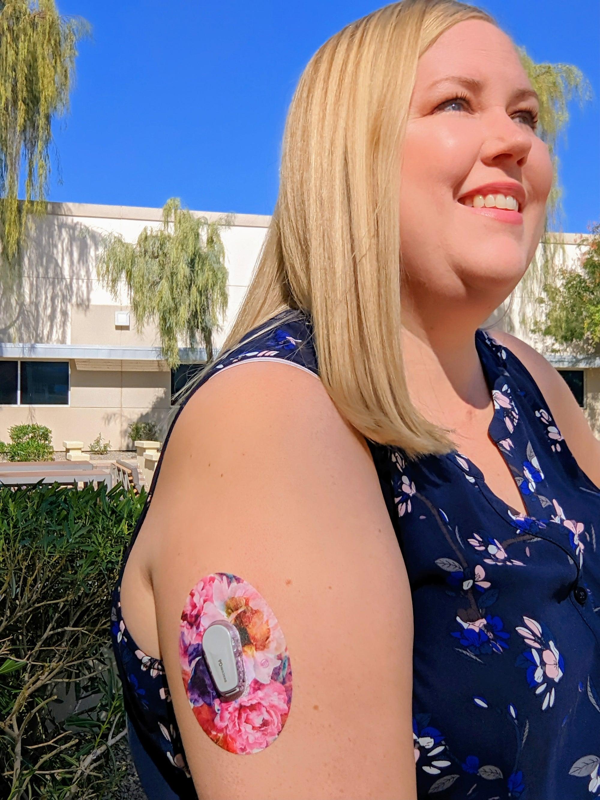 ExpressionMed Bursting Blooms Variety Pack Dexcom G6 Tape, Single Tape, Woman Wearing Floral Themed CGM Adhesive Patch Design