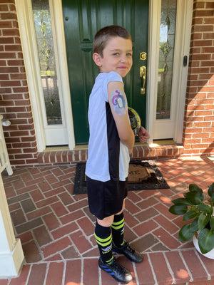 ExpressionMed Beachy Variety Pack Dexcom G6 Tape, Single Tape, Boy Wearing Beach Themed CGM Adhesive Patch Design