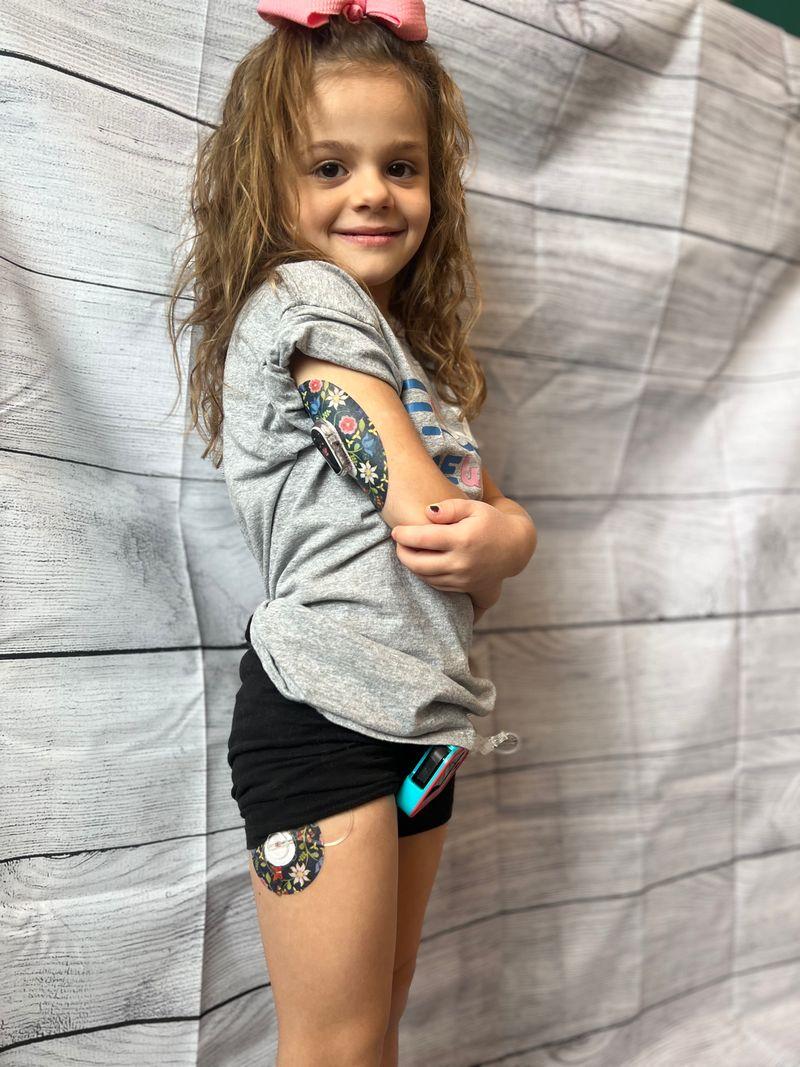 ExpressionMed Moody Moment Variety Pack Dexcom G6 Transmitter Sticker, Multiple Tape and Single Sticker, Woman Wearing Floral Themed CGM Adhesive Patch Design