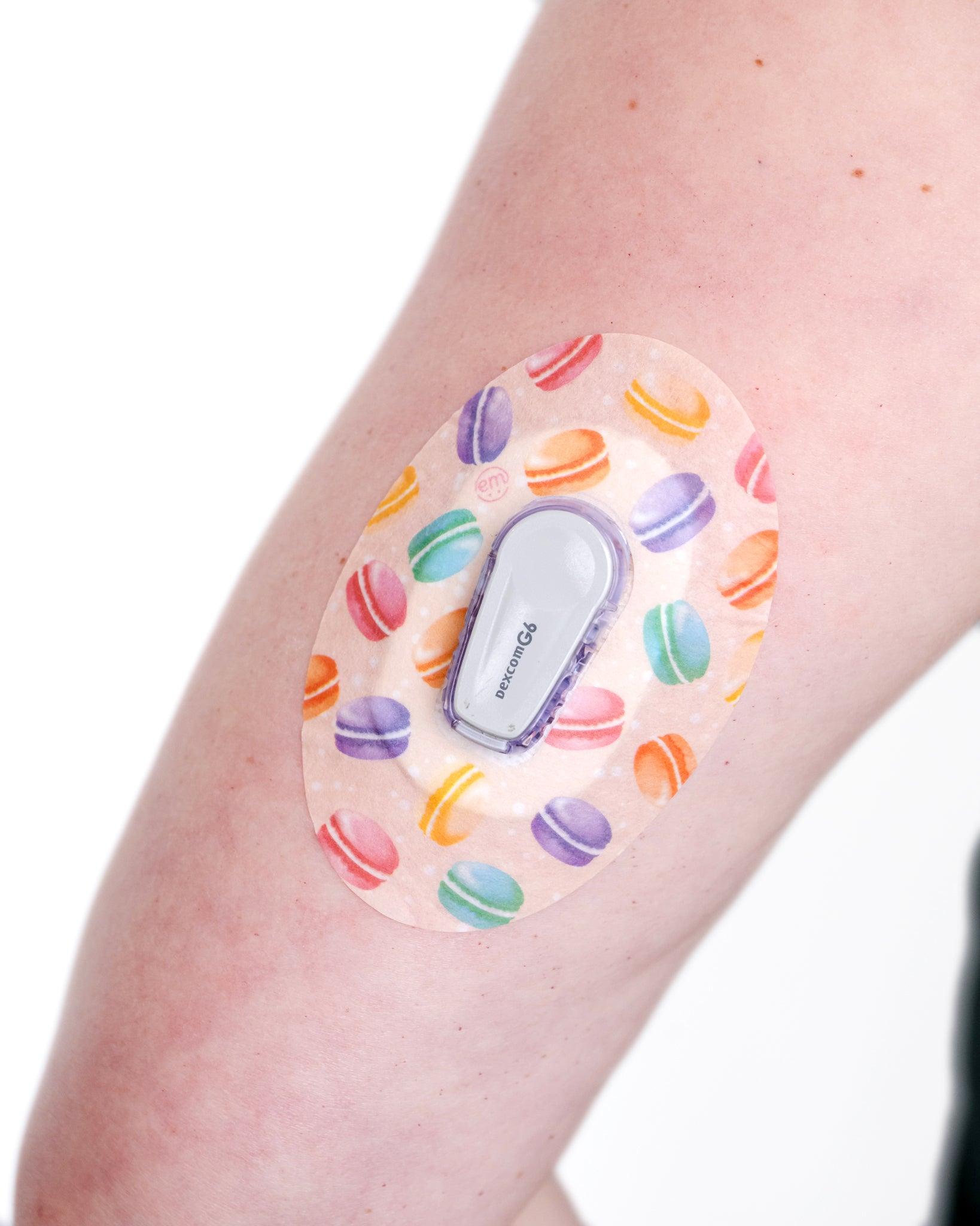 ExpressionMed Macarons Dexcom G6 Tape in use on arm