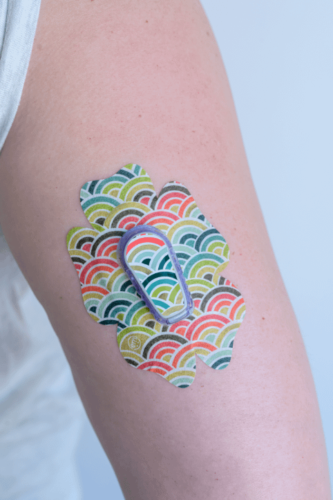 ExpressionMed, Coral Mint Dexcom G6 Flower Tape, Tape & Sticker, Human Wearing Coral Mint Themed CGM Adhesive Patch Design