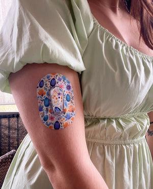 ExpressionMed Eastery Vibes Variety Pack Dexcom G6 Mini Tape, Single Tape and Single Sticker, Woman Wearing Floral Themed CGM Adhesive Patch Design