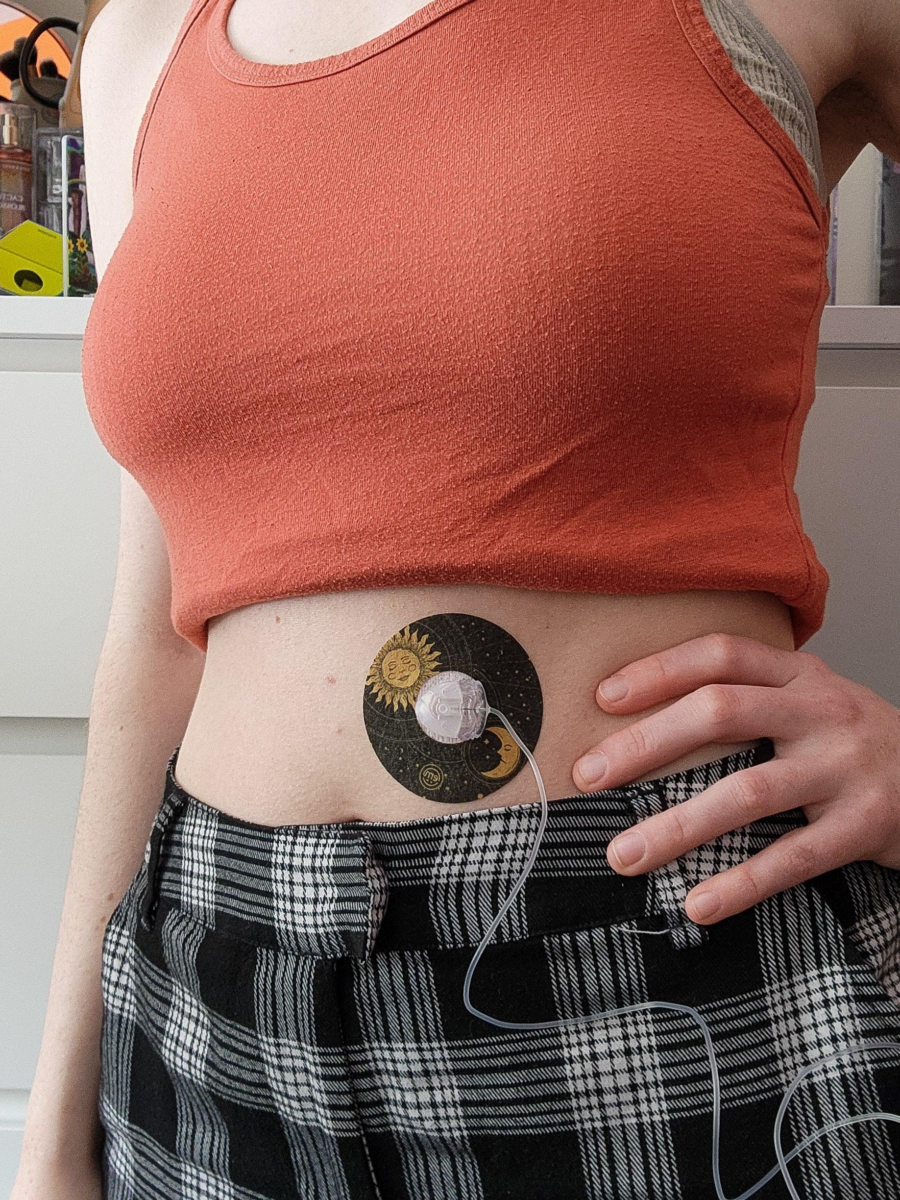 ExpressionMed, Cosmic Vibes Infusion Set Tape, Single Tape, Woman Wearing Cosmic Themed CGM Adhesive Patch Design