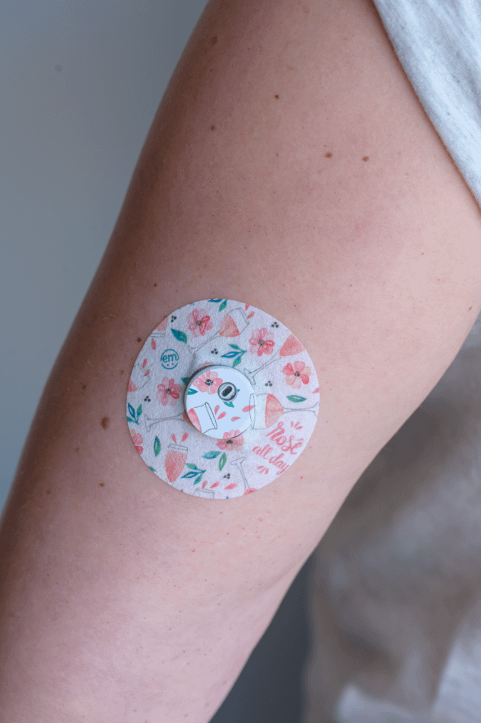 ExpressionMed, Rose All Day Libre 3 Tape, Tape & Sticker, Human Wearing Rose Themed CGM Adhesive Patch Design