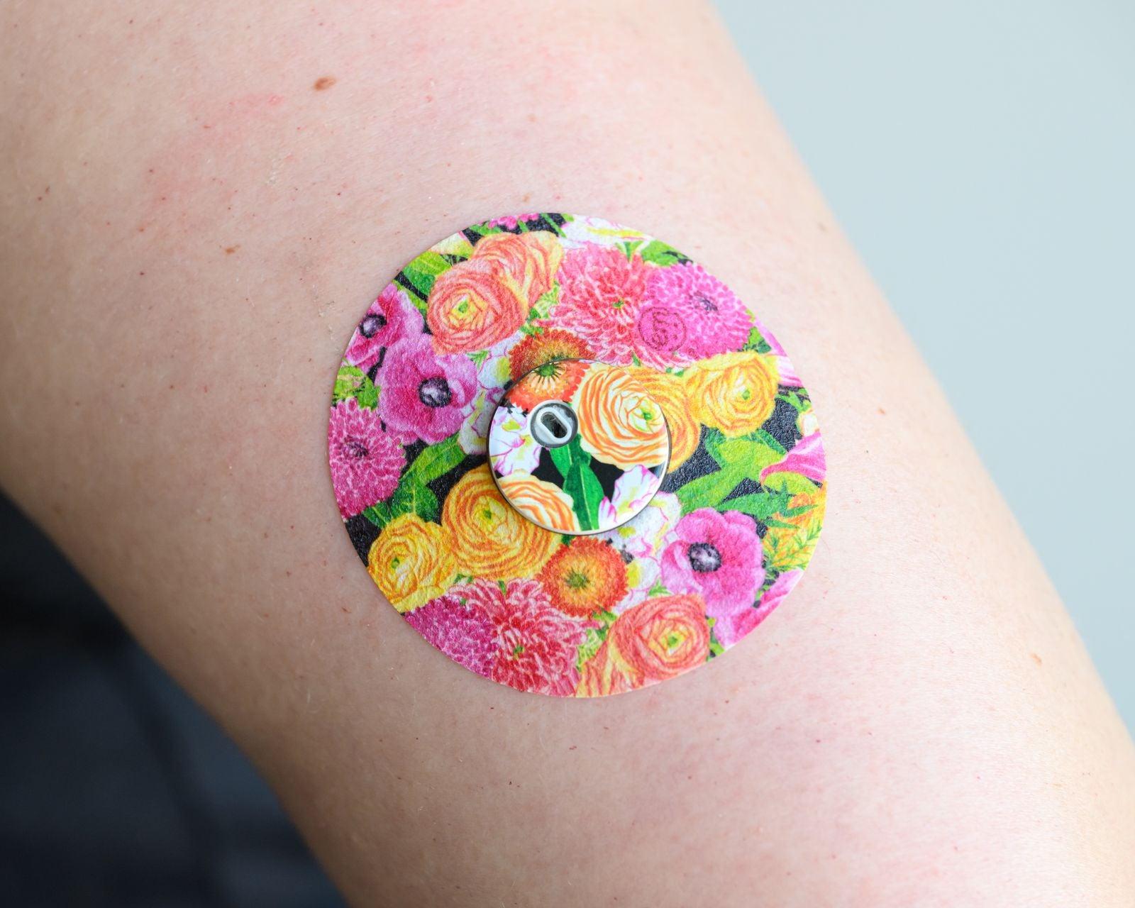 ExpressionMed Hand Painted Flowers Libre 3 Tape, Single Tape and Sticker, Arm Wearing Floral Themed CGM Adhesive Patch Design