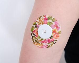 ExpressionMed Floral Strokes Variety Pack Libre 2 Tape, Single Tape, Arm Wearing Floral Themed CGM Adhesive Patch Design