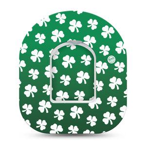 ExpressionMed Shamrock Omnipod Tape, Single Tape and Single Sticker White Shamrocks over Green Background, Adhesive Patch Pump Design