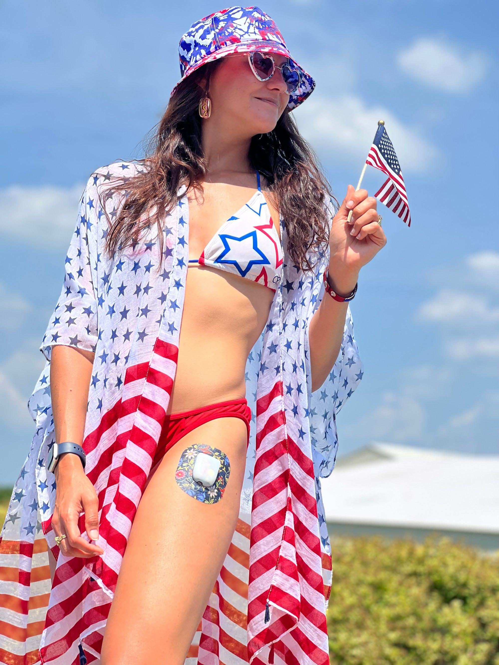 ExpressionMed Woman outdoors in patriotic outfit and accessories with floral folklore pod tape on leg