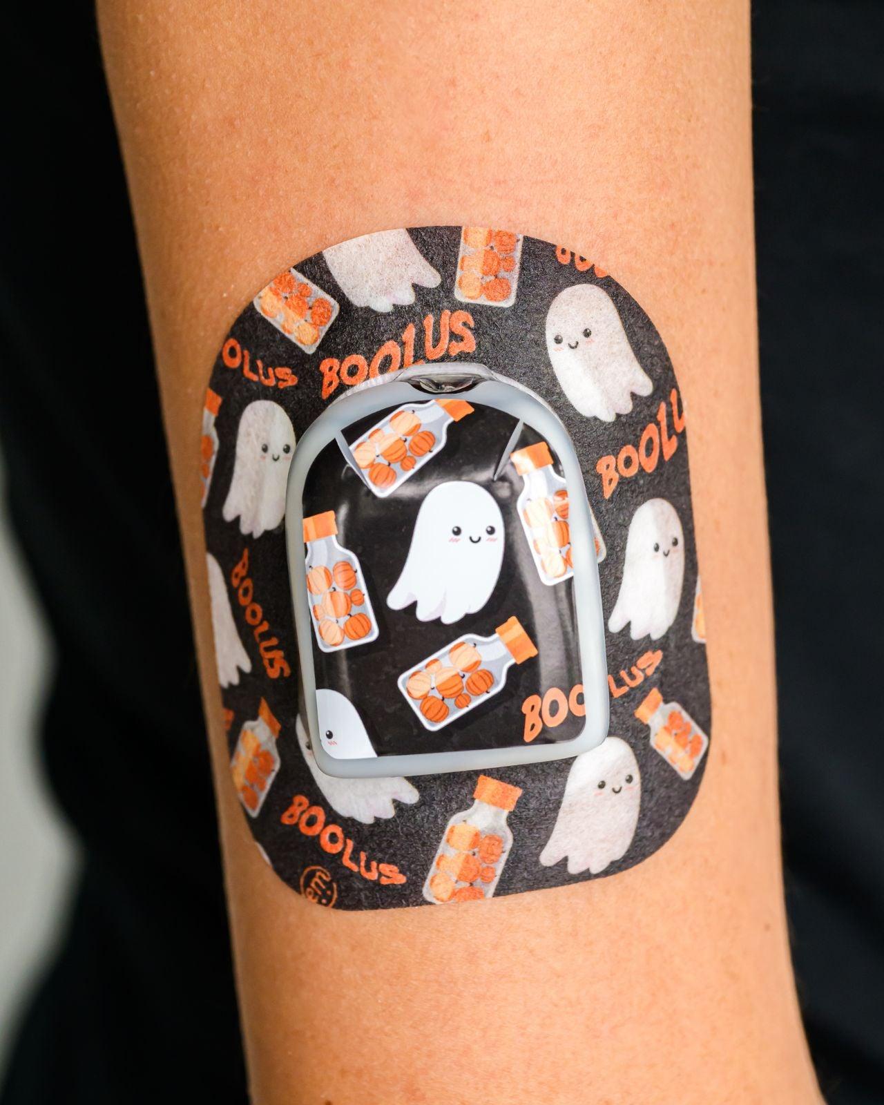 ExpressionMed, Boolus Pod Center Sticker, Tape & Sticker, Human Wearing Boolus Themed CGM Adhesive Patch Design