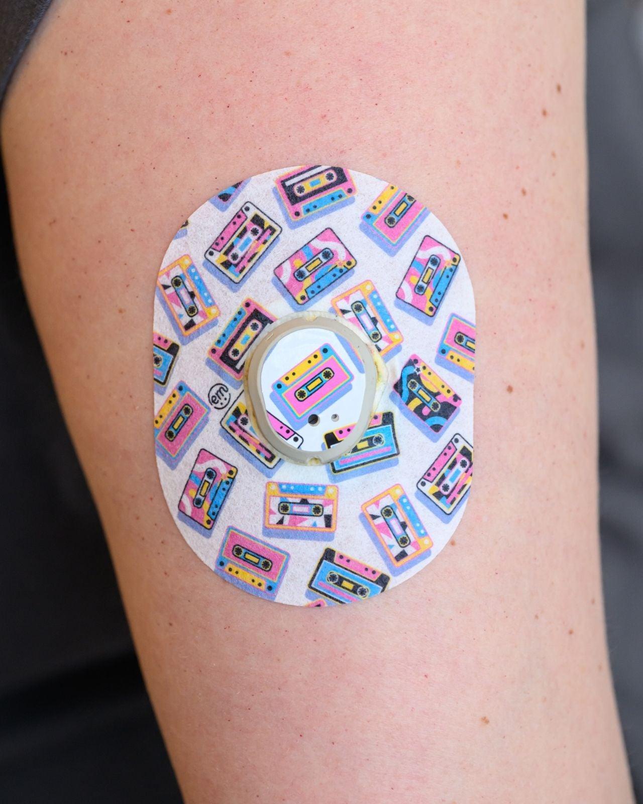 ExpressionMed, Vintage Music Tapes Dexcom G7 and Stelo Mini Tape, Tape & Sticker, Human Wearing Music Tapes Themed CGM Adhesive Patch Design