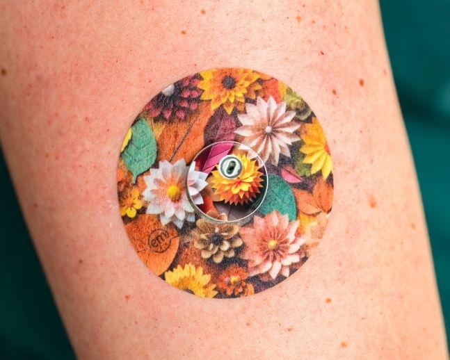 ExpressionMed, 3D Floral Libre 3 Transmitter Sticker, Tape & Sticker, Human Wearing 3D Floral Themed CGM Adhesive Patch Design