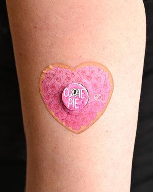 ExpressionMed, Cutie Pie Cookie Libre 3 Heart Tape, Tape & Sticker, Human Wearing Cutie Pie Cookie Themed CGM Adhesive Patch Design