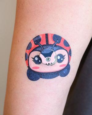 ExpressionMed, Lady Bug Libre 3 Cute Tape, Tape & Sticker, Human Wearing Lady Bug Themed CGM Adhesive Patch Design