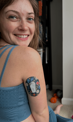 ExpressionMed Woman with Floral Folklore Dexcom G6 Mini Tape on arm