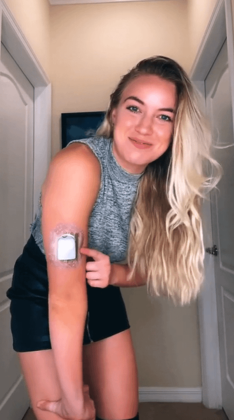 ExpressionMed Woman with drippings sparkles pod tape on arm
