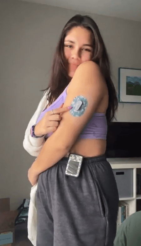 ExpressionMed Woman with Muted Petals Dexcom G6 Mini Tape on arm