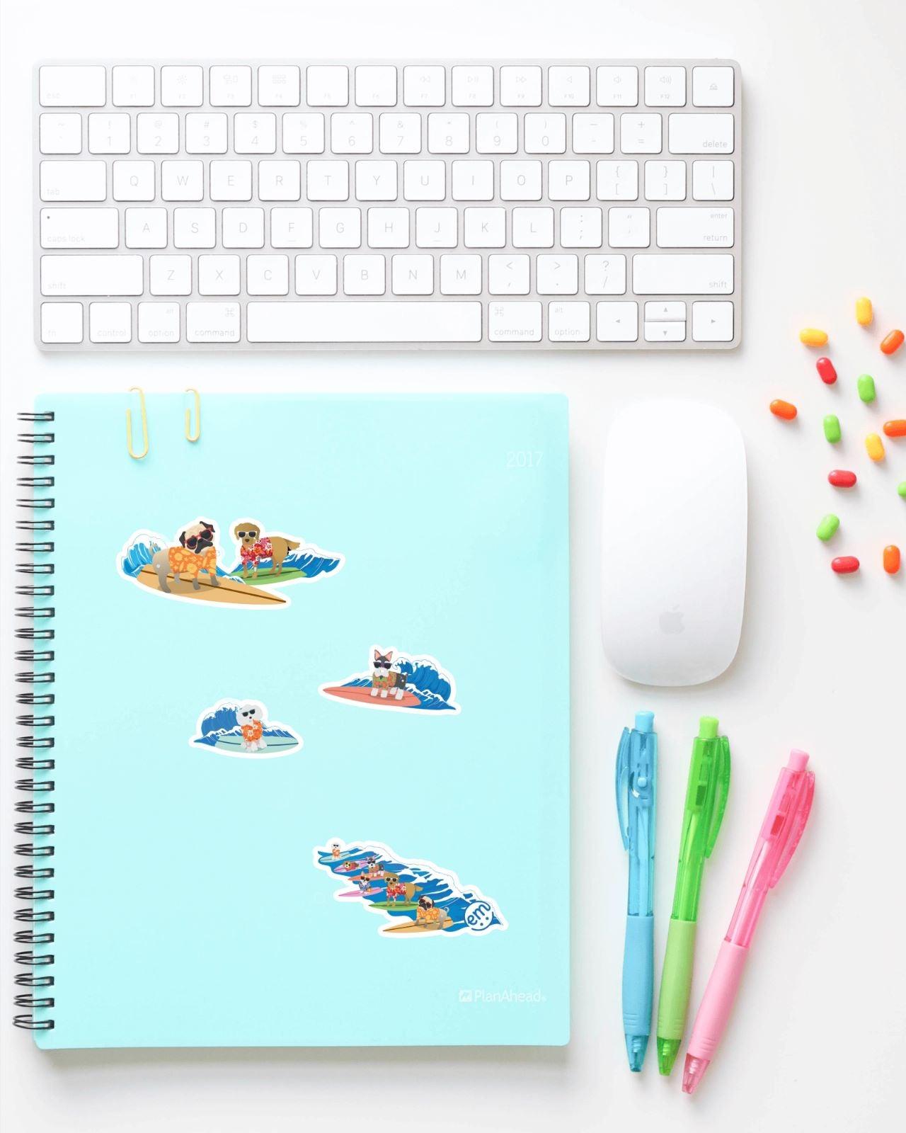 Surfing Dog stickers on notebook