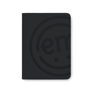 A sleek and classic black album, perfect for organizing a large collection of CGM and pump tapes.