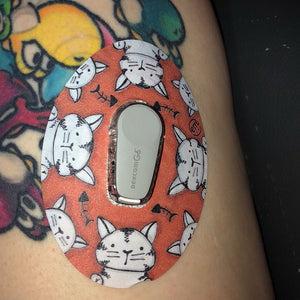 ExpressionMed Kitty Cat Variety Pack Dexcom G6 Tape, Single Tape, Human Wearing Cat Themed CGM Adhesive Patch Design