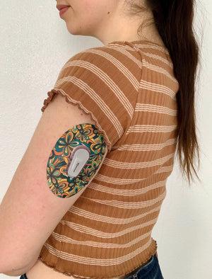 ExpressionMed Greenery Variety Pack Dexcom G6 Tape, Single Tape, Woman Wearing Floral Themed CGM Adhesive Patch Design