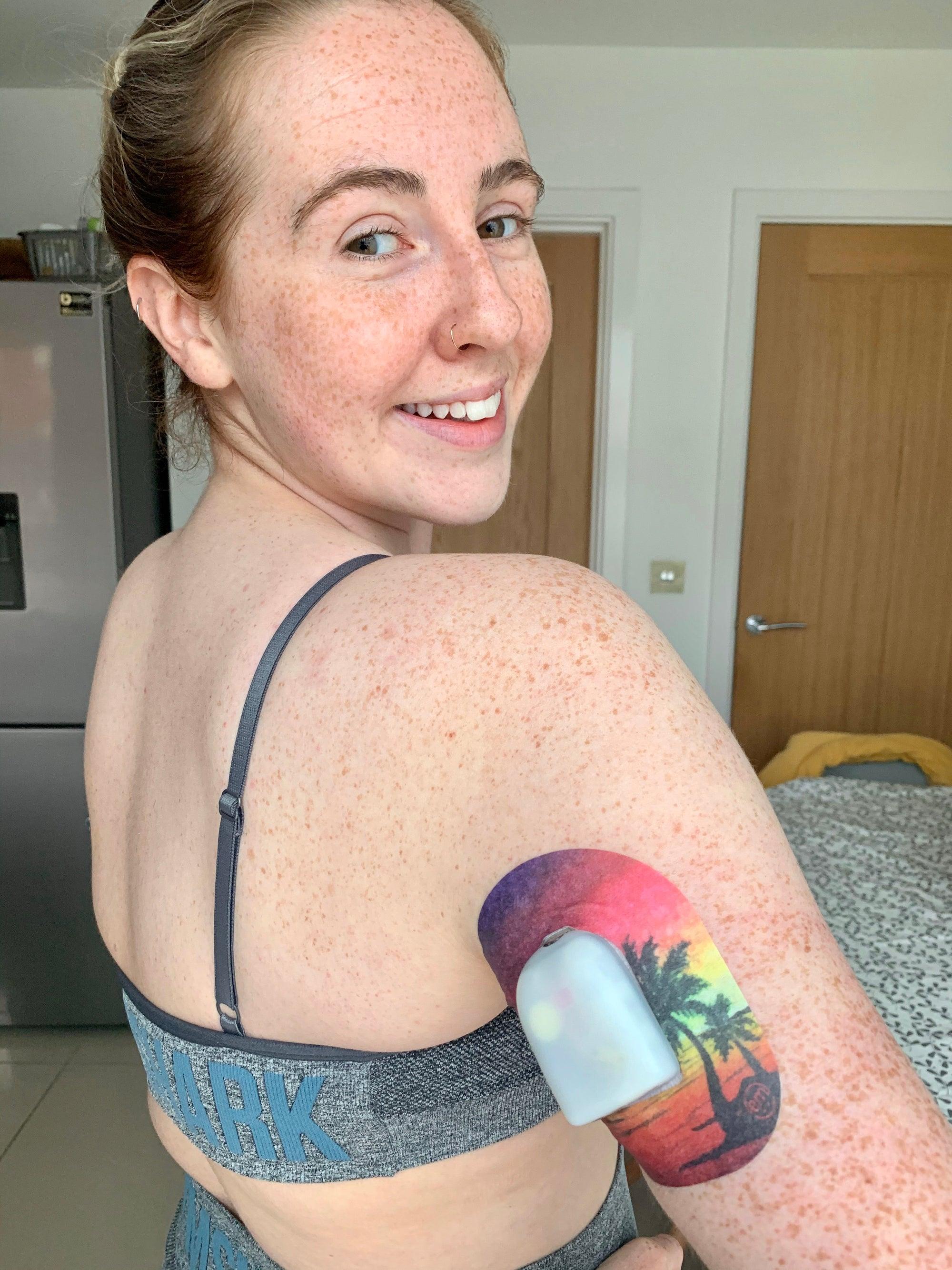 Woman with Sunset Pod Tape on arm