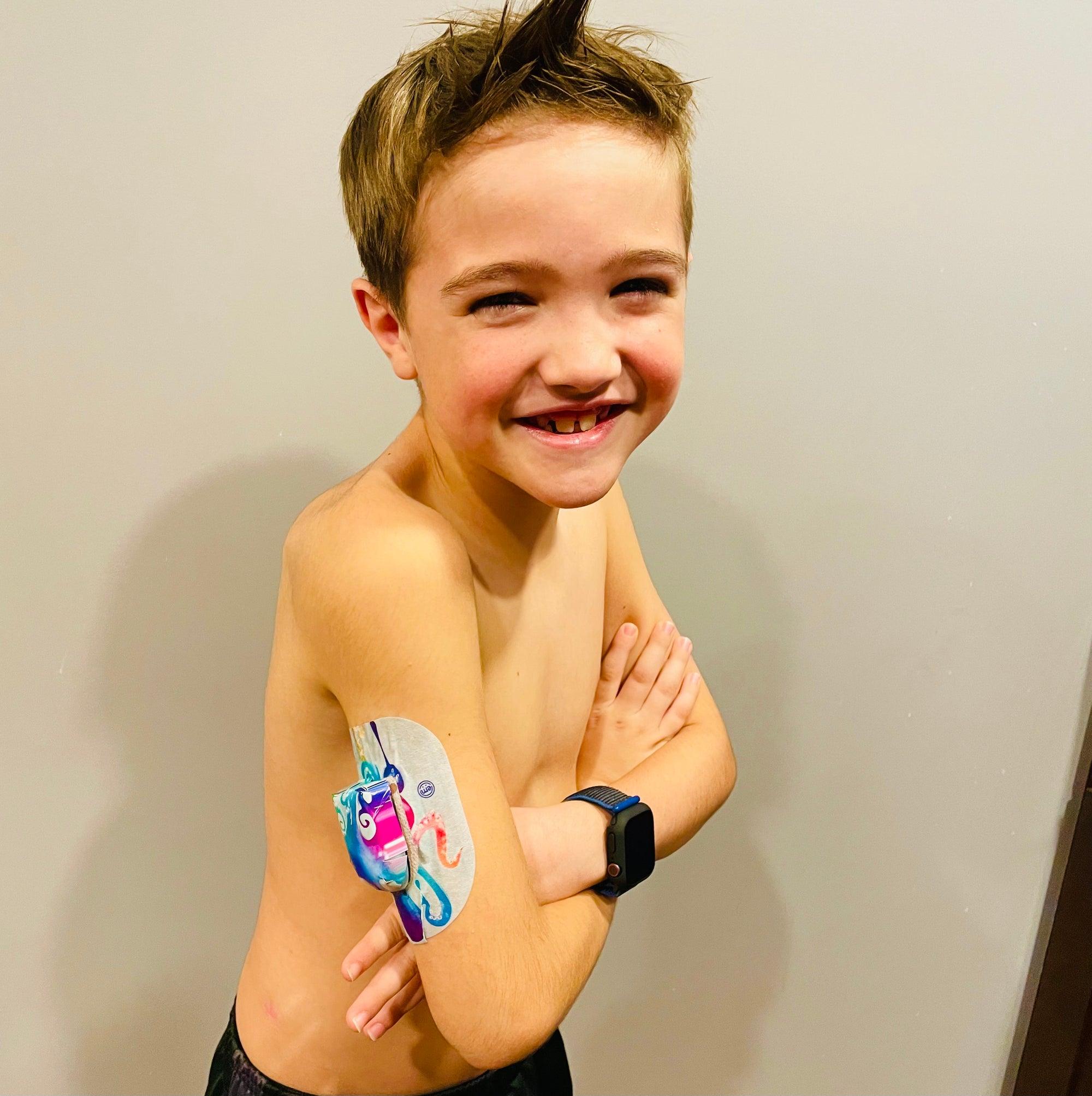 ExpressionMed Little boy with octopus tattoo pod tape and sticker