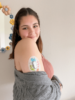 ExpressionMed Gooseberry Puppies Dexcom G6 Transmitter Sticker, Single Tape and Single Sticker, Woman Wearing Puppies Themed CGM Adhesive Patch Design