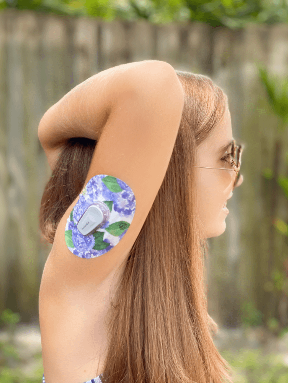 ExpressionMed Purple Petals Variety Pack Dexcom G6 Tape, Single Tape, Woman Wearing Floral Themed CGM Adhesive Patch Design