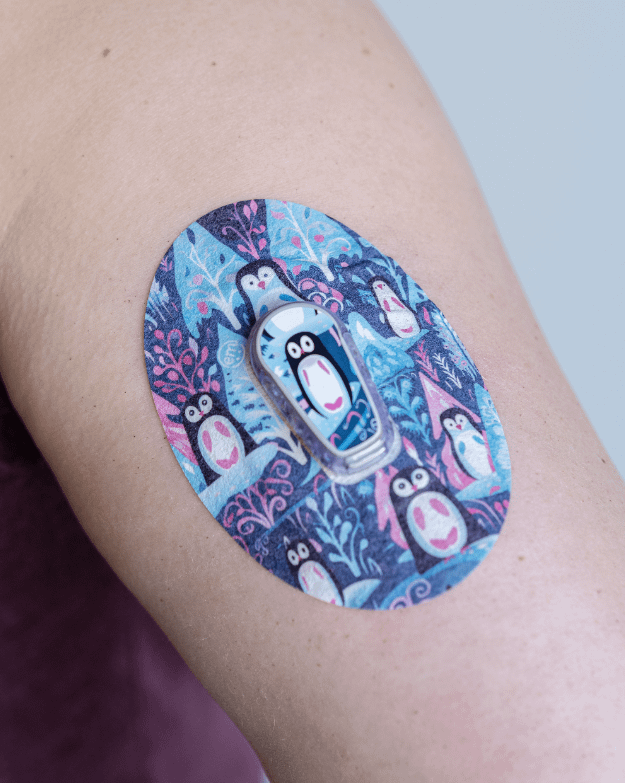 ExpressionMed, Penguins Dexcom G6 Tape, Single Tape and Single Sticker, Arm Wearing Penguin Themed CGM Adhesive Patch Design